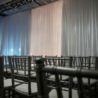 Event-Drapery-and-Black-Wedding-Chairs